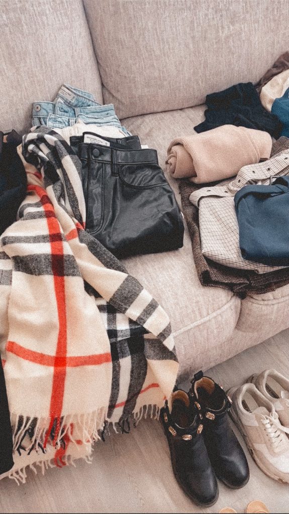 To perfect my packing list, I like to lay out my clothing/outfit options to be sure I like my options. 